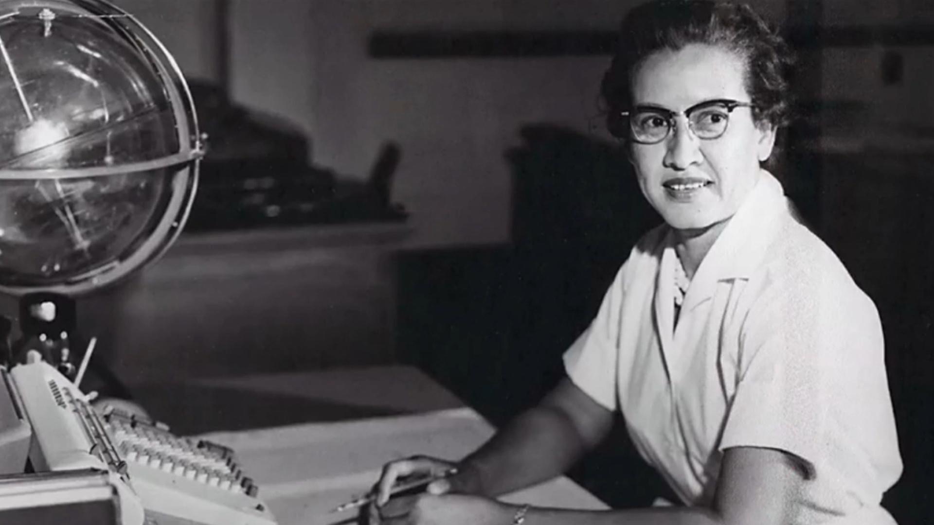 Katherine Johnson of NASA sitting at her desk